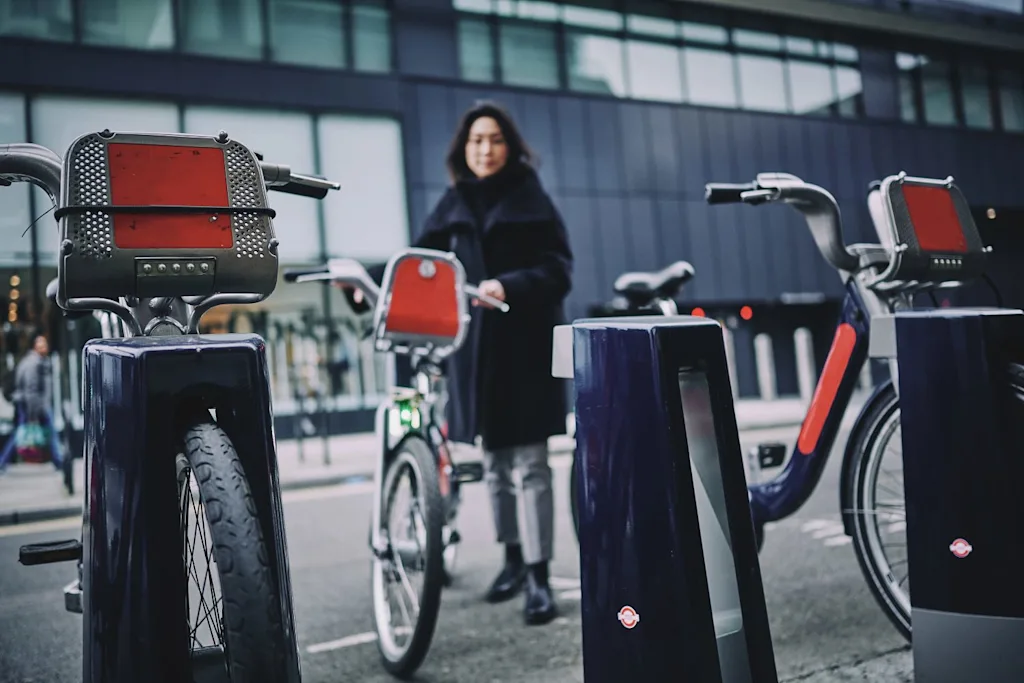 bikeshare outdoors woman parking lot blog