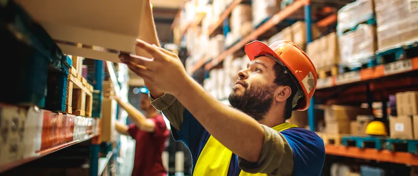 man stock supply chain warehouse package delivery.png