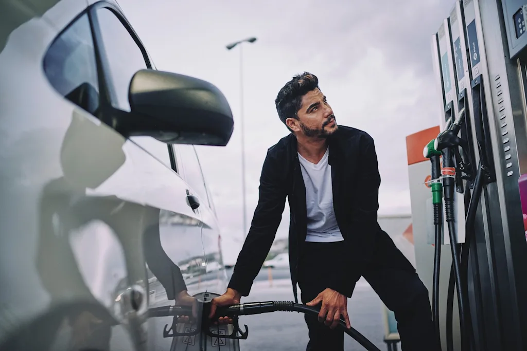 here malaga ev electric car vehicle man charging station blog