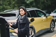 london 2 driver woman electric car vehicle ev automotive charging station blog.jpeg