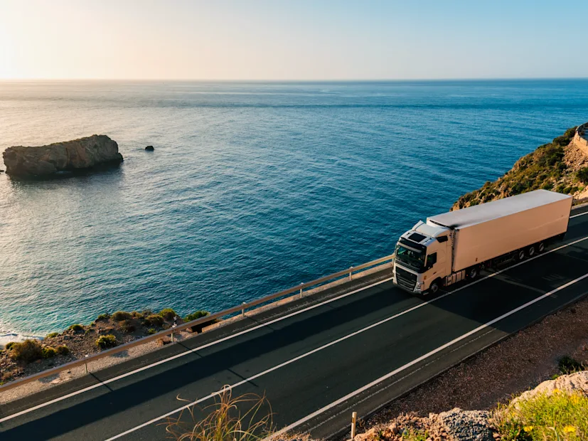 truck coastal highway ocean sea fleet management supply chain logistics.png