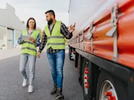 man woman truck fleet management tablet.png