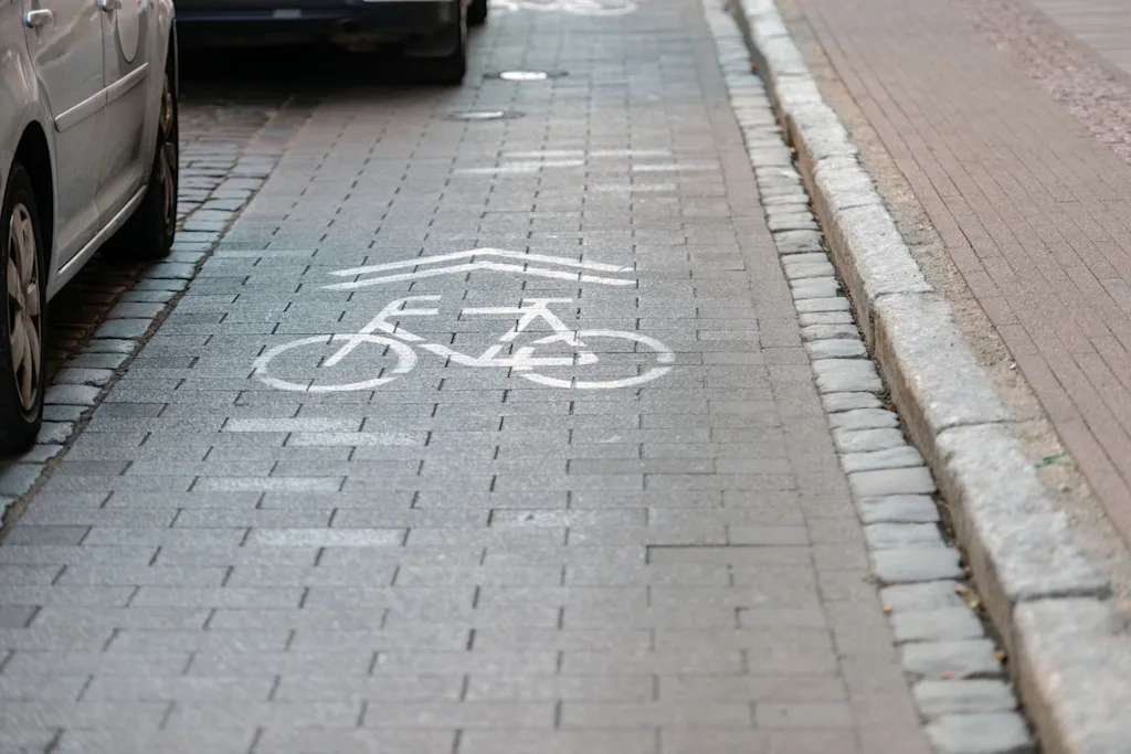 cobbled street with separate lanes for cyclists path bike lane cycle bicycle street background t20 gop44x blog
