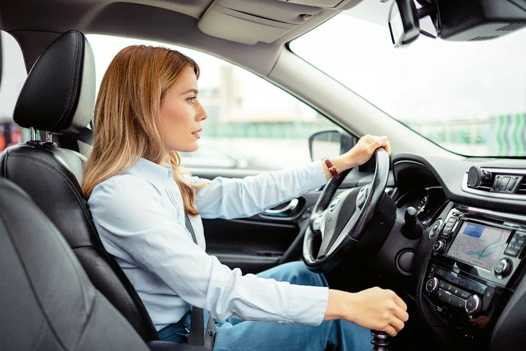 Woman inside car driving