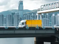 transportation logistics truck trucks supply chain bridge overpass apac skyline.jpg