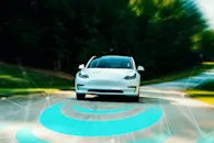 Autonomous vehicle driving on road toward camera
