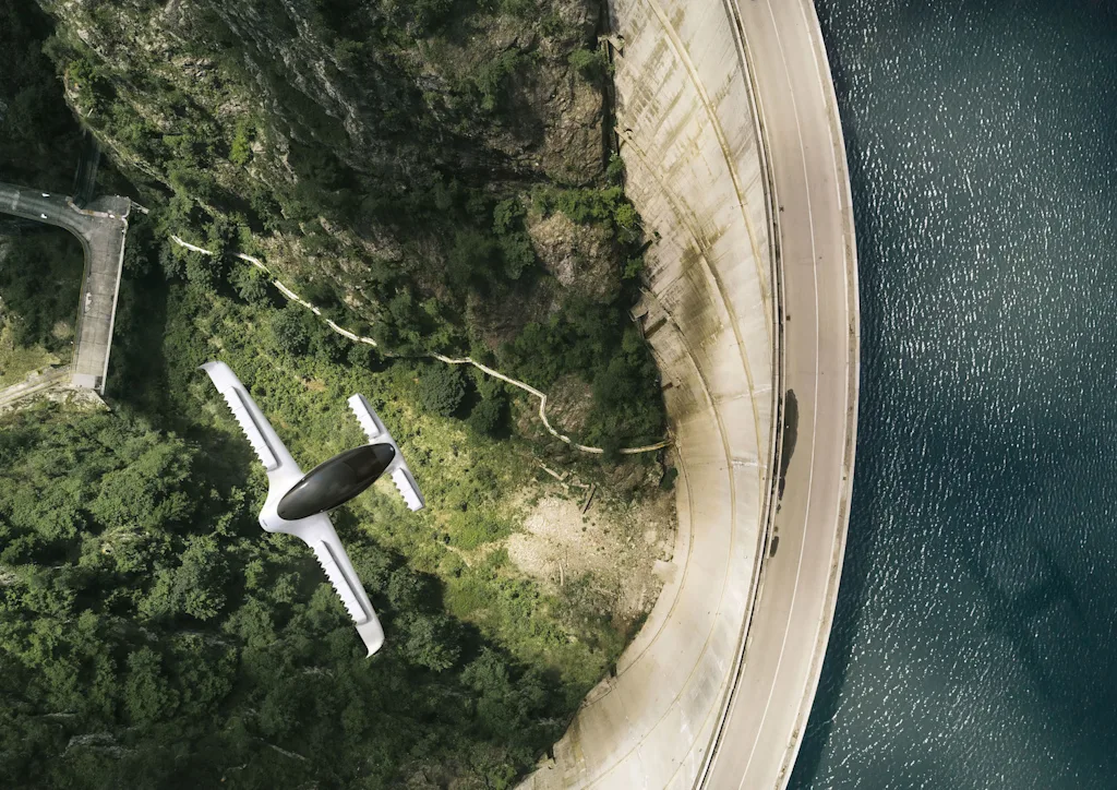 lilium fo005 air taxi flying over dam screen blog