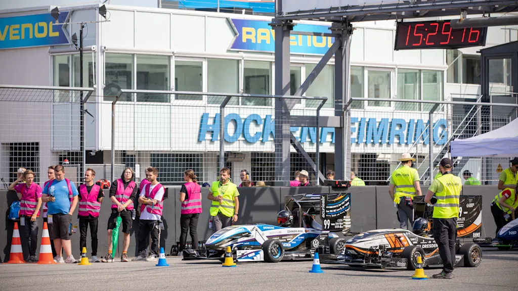 Ecurie Aix race car on track