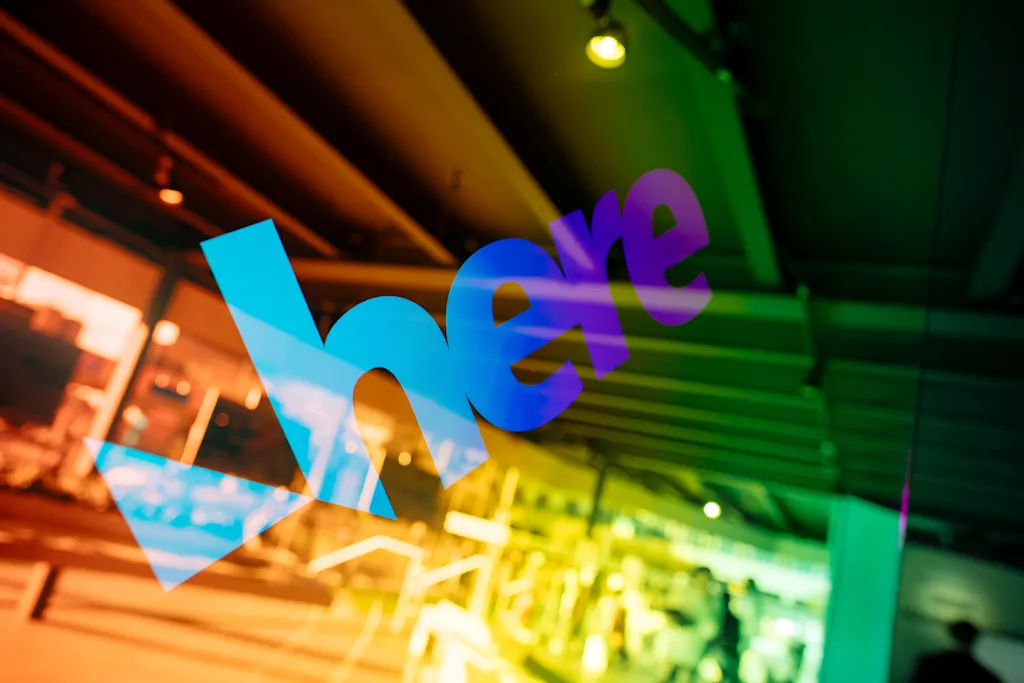 The HERE logo as visible at the HERE Technologies stand at CES in Las Vegas in January 2020.jpg