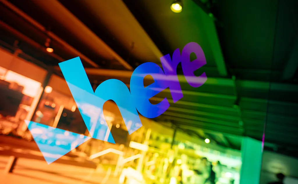 The HERE logo as visible at the HERE Technologies stand at CES in Las Vegas in January 2020.jpg