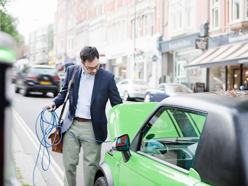 electric vehicle ev charge point charging street road.png