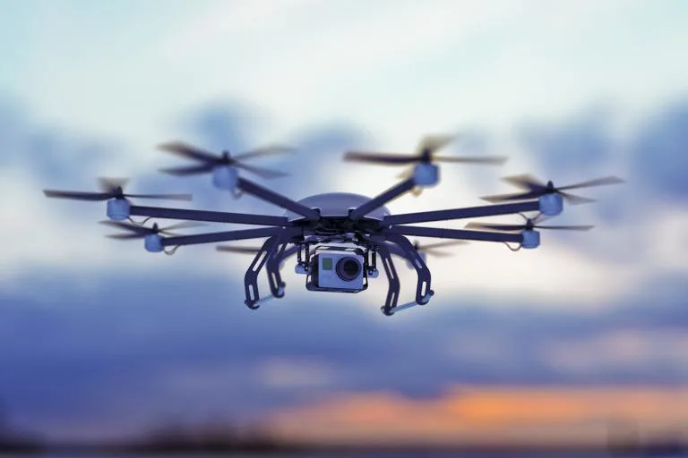 drone flying at dusk sky blog